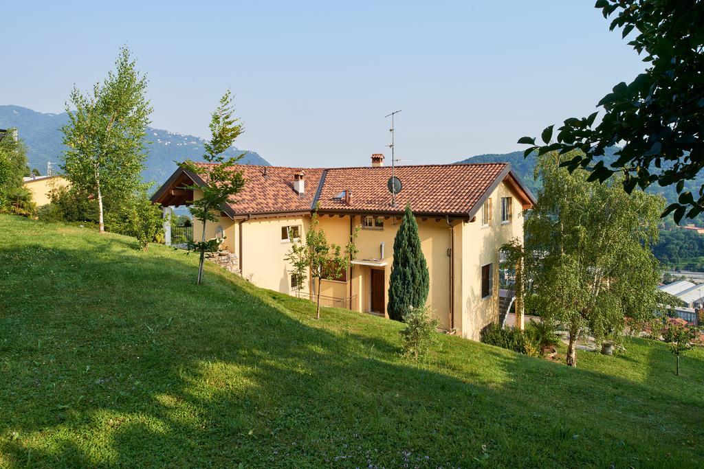 Comova Maslianico Luaran gambar